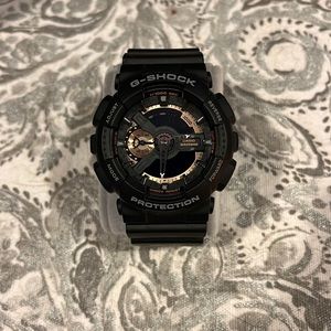 G-Shock watch! Super cool black and gold in perfect condition! Needs new battery